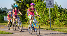 Photo: Family Bicycling on Trail
