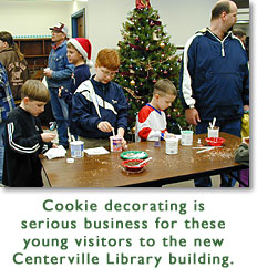 Cookie decorating is serious business for these young visitors to the new Centerville Library building.