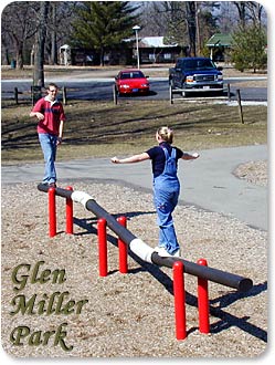 Teens enjoy the moving balance beam at Glen Miller Park.