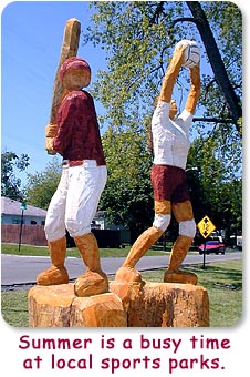 Summer is a busy time at local sports parks.  Photo of sculpture by Dayle Lewis.