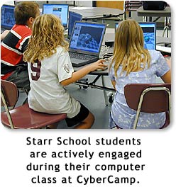 Starr School students are actively engaged during their computer class at CyberCamp.