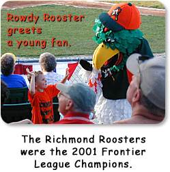 Rowdy Rooster greets a young fan.  The Richmond Roosters were the 2001 Frontier League Champions.