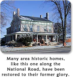 Many area historic homes, like this one along the National Road, have been restored to their former glory.