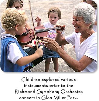 Children explored various instruments prior to the Richmond Symphony Orchestra concert in Glen Miller Park.