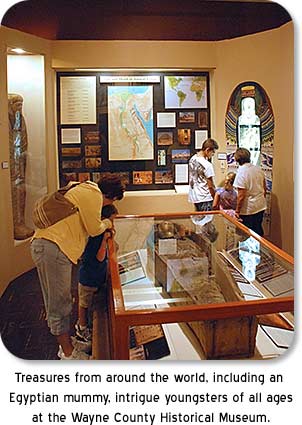 Treasures from around the world, including an Egyptian mummy, intrigue youngsters of all ages at the Wayne County Historical Museum.
