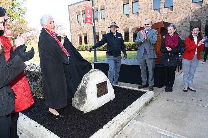 Supplied Photo: IU East Chancellor Kathy Cruz-Uribe unveils the IU Bicentennial Marker during the dedication ceremony held November 5 in front of Whitewater Hall.