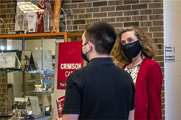 Supplied Photo:  IU President-elect Pamela Whitten listens as IU East student Zachery Honeycutt shares about the academic programs and resources available in Hayes Hall. Honeycutt is an Admissions Ambassador for the Office of Admissions.