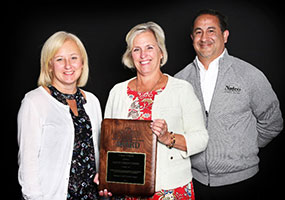 Supplied Photo:  NATCO Employees with Award