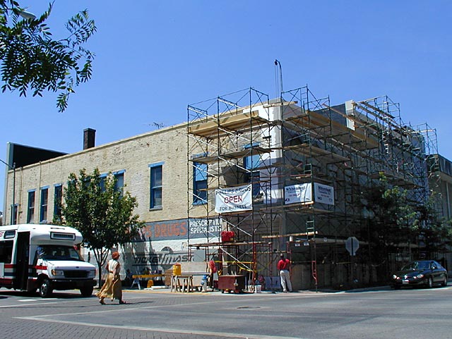 2000 - July 24 - Phillips Drugs with scaffolding in front of building.