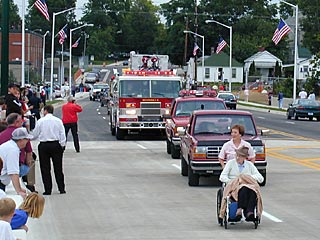 Wheelchair in parade.
