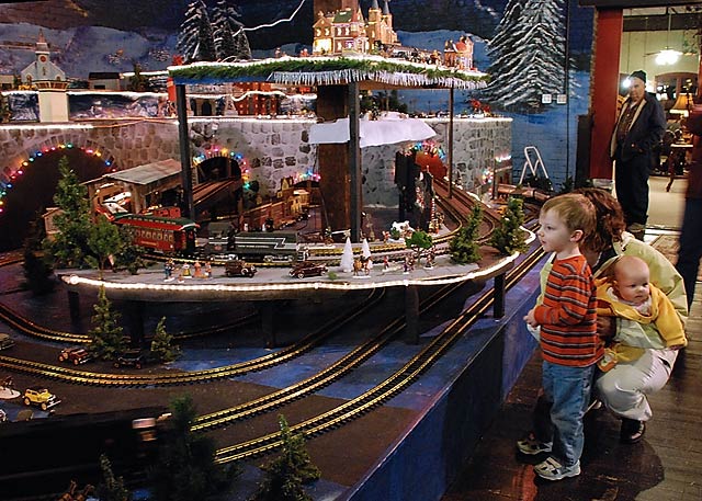 Boy enjoying model train exhibit.  - Click to view on Flickr.