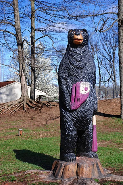 Carved Black Bear with baseball mitt and bat.  Click to view on Flickr.